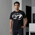 Diesel black drop shoulder t-shirt – man wearing in modern office setting