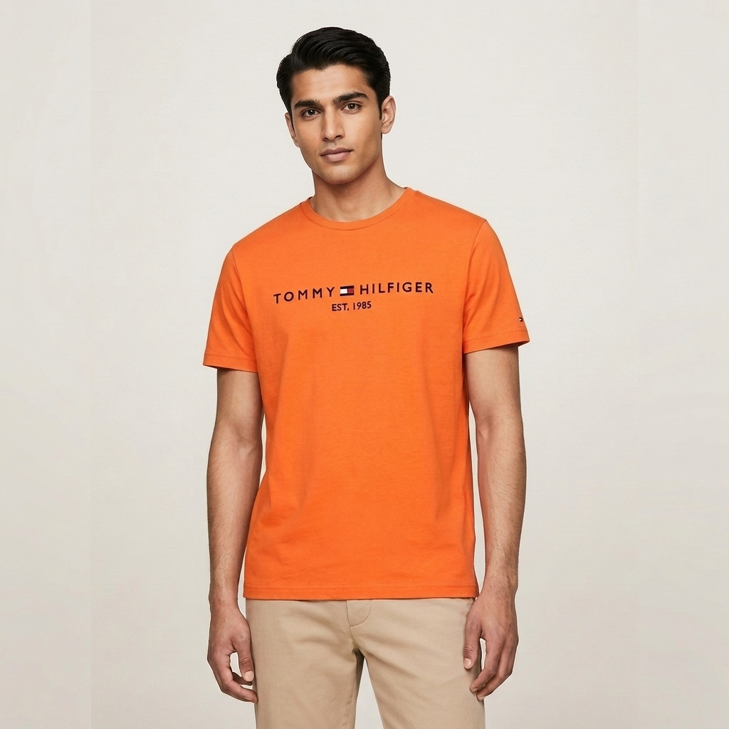 Tommy Hilfiger orange t-shirt – man wearing front view on light background