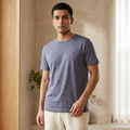 Tommy Hilfiger gray regular fit t-shirt – flat lay on linen surface showing flag logo detail