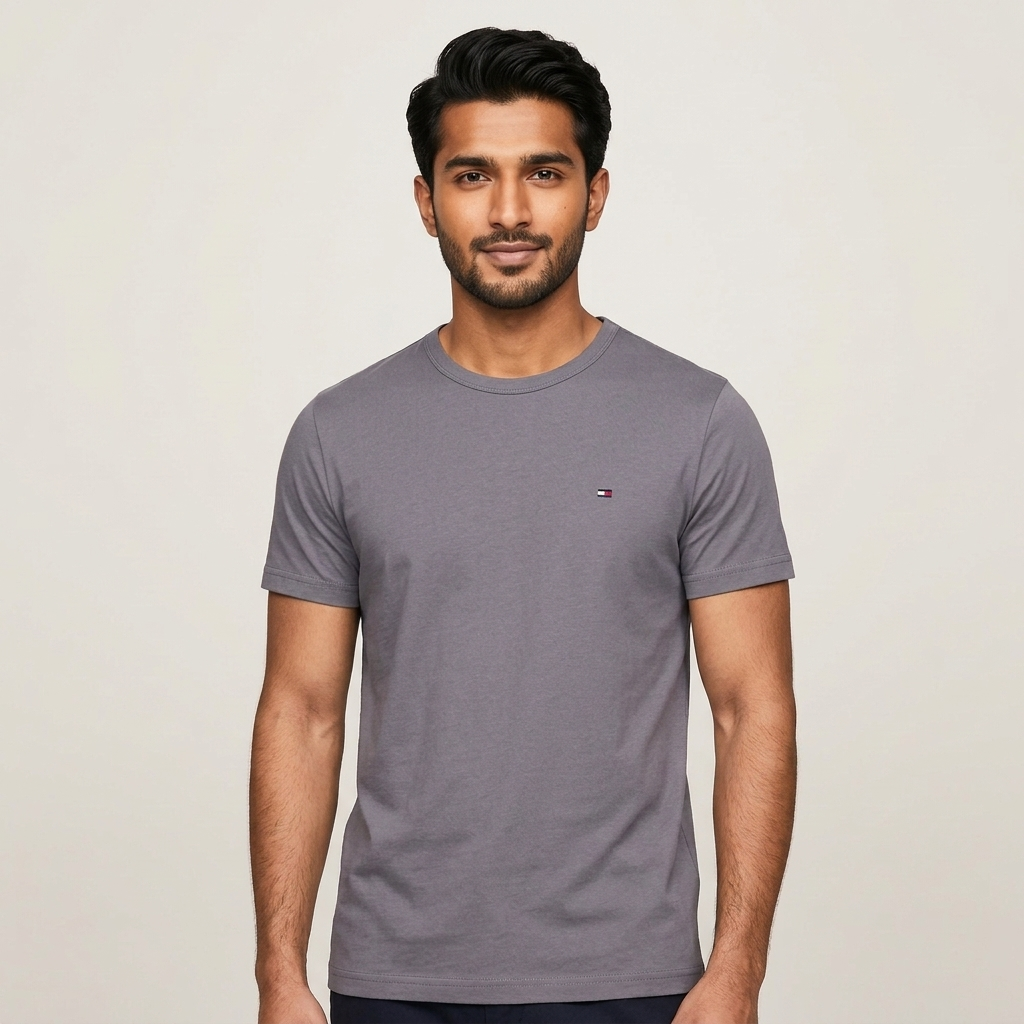 Tommy Hilfiger gray regular fit t-shirt – man wearing front view on light background